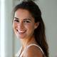 Sarah, 42, smiling contentedly